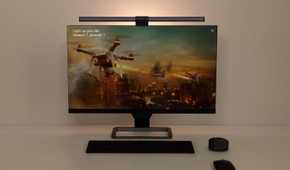 Monitor with a light bar installed at the top