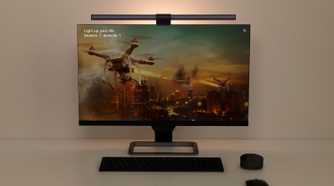Monitor with a light bar installed at the top