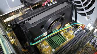 An image showing a Pentium II slot CPU form installed on a motherboard.