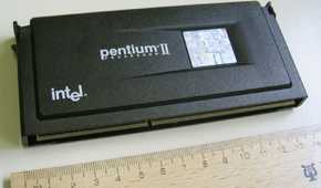 An image showing a Pentium II slot CPU kept next to a ruler for scale.