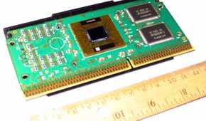 An image showing a Pentium III (Katmai) processor kept on a table next to a ruler.