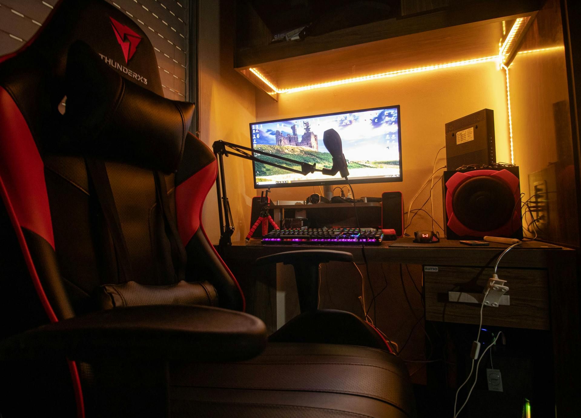 Gaming setup with computer, modem, and router