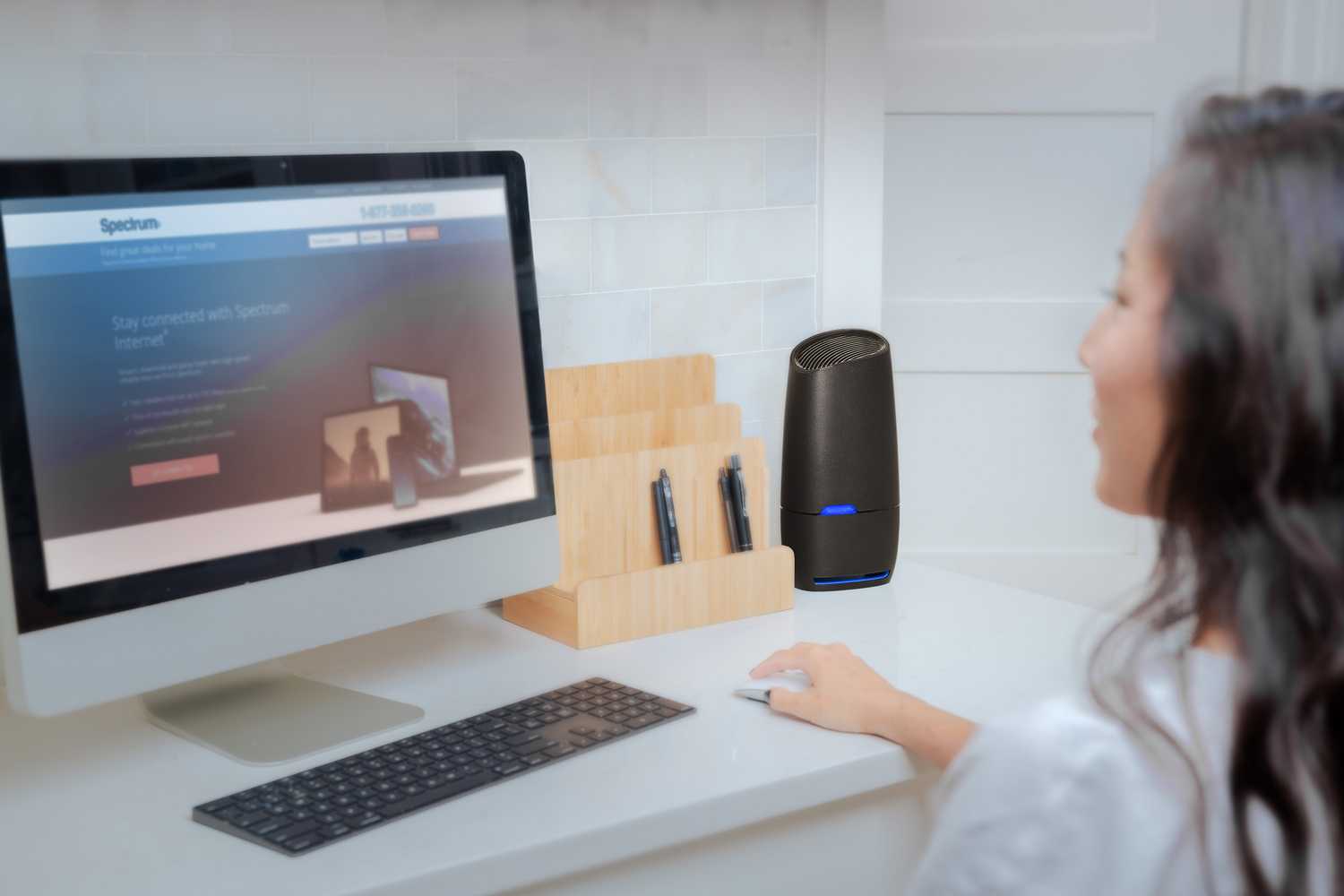 Spectrum Wi-Fi router on computer desk