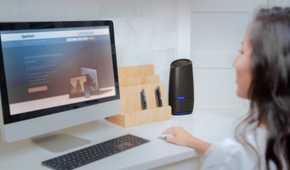 Spectrum Wi-Fi router on computer desk