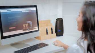 Spectrum Wi-Fi router on computer desk
