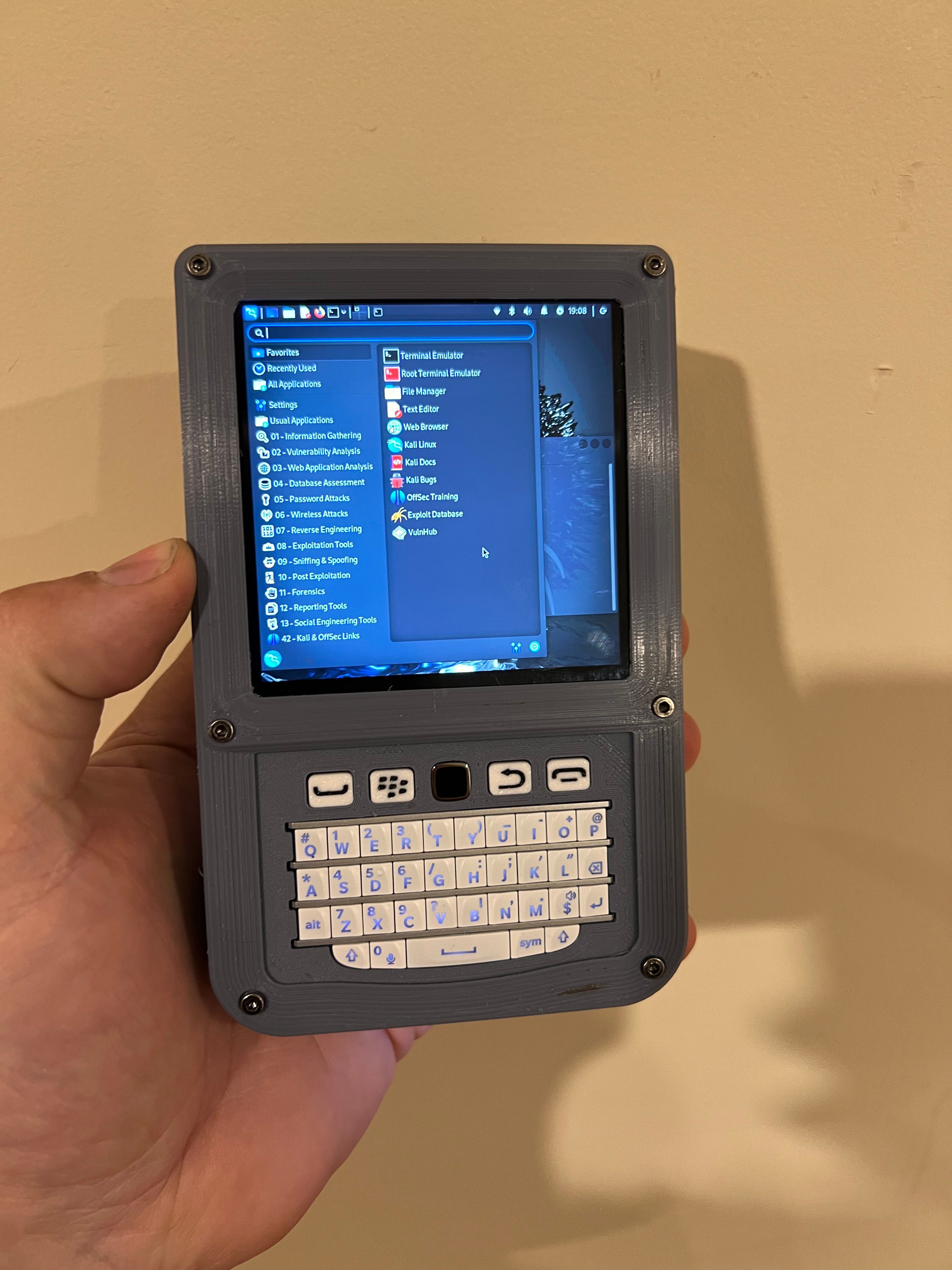 This Pi-powered pocket PC features a Blackberry keyboard and trackpad