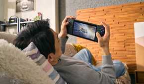 A man playing on the ASUS ROG Ally X