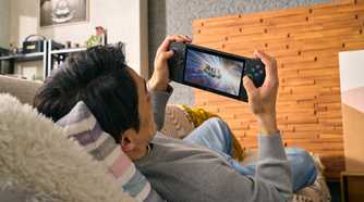 A man playing on the ASUS ROG Ally X