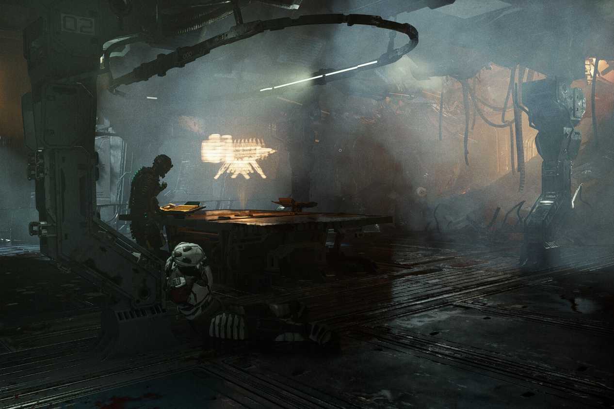 Screenshot from Dead Space 2023 showing Isaac standing near a desk in a destroyed room