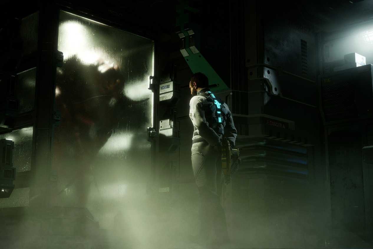 Screenshot from Dead Space 2023 showing a person staring at a glass container