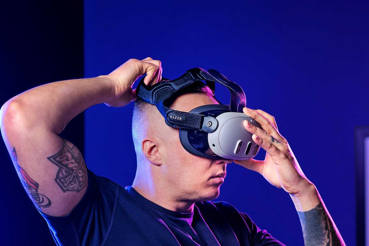 Person putting on VR headset