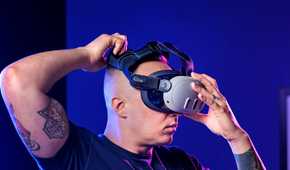 Person putting on VR headset