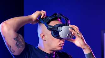 Person putting on VR headset