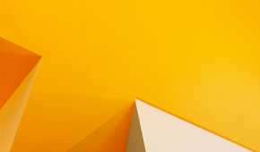 Abstract geometric wallpaper in yellow and cream colors