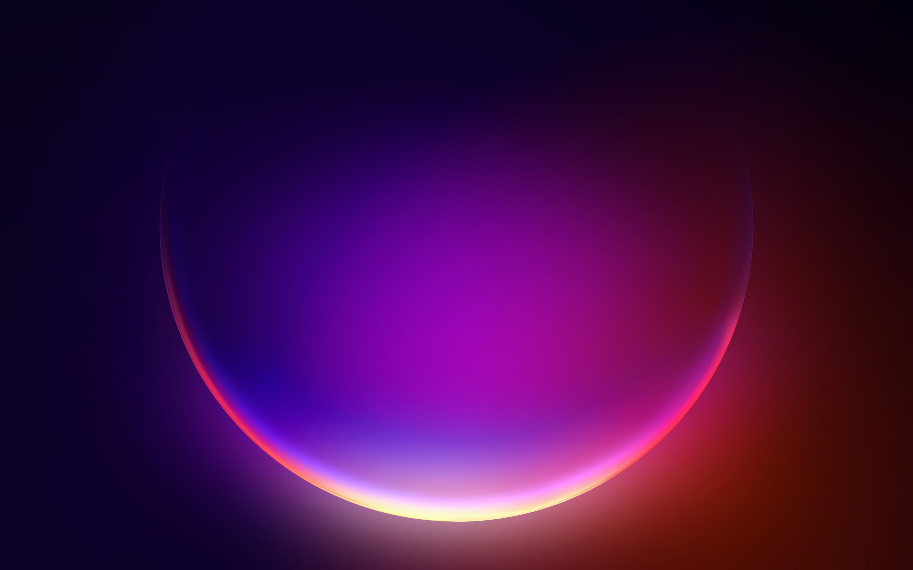 A purple and red circle in a dark background