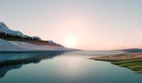 A lake with the sun rising behind the mountains