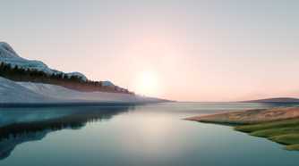A lake with the sun rising behind the mountains