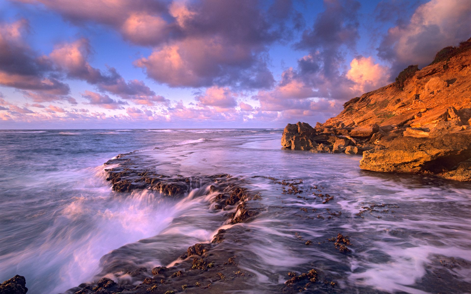 Coastal scenery with waterfalls