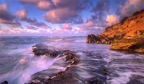 Coastal scenery with waterfalls
