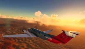 Screenshot from Microsoft Flight Simulator 2020 showing a plane flying over sunset-lit clouds