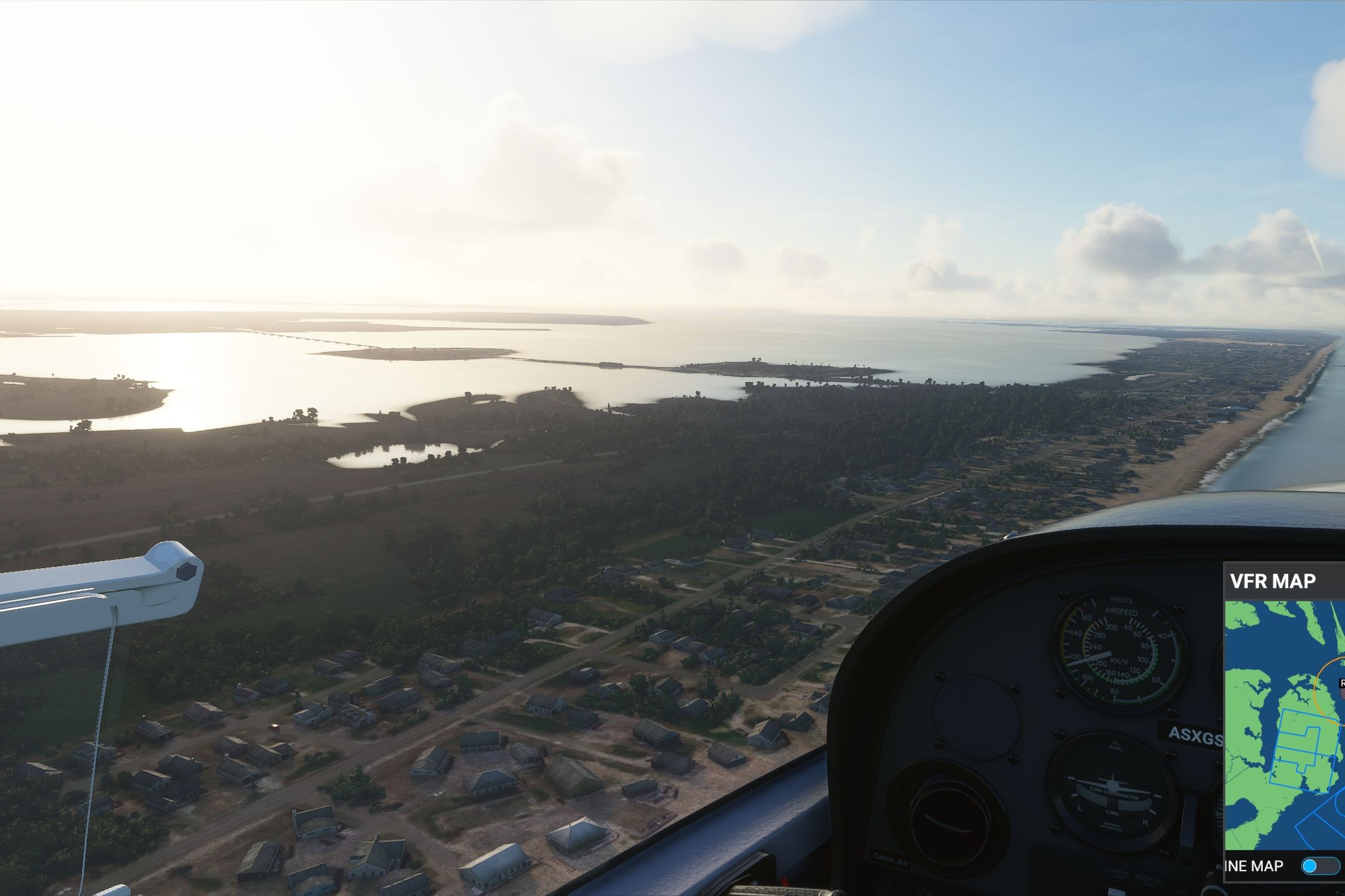 Screenshot from Microsoft Flight Simulator 2020 showing the coast and water reflections