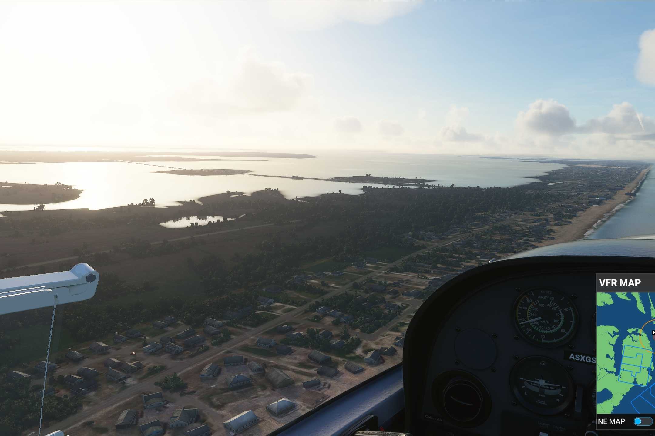 Screenshot from Microsoft Flight Simulator 2020 showing the coast and water reflections