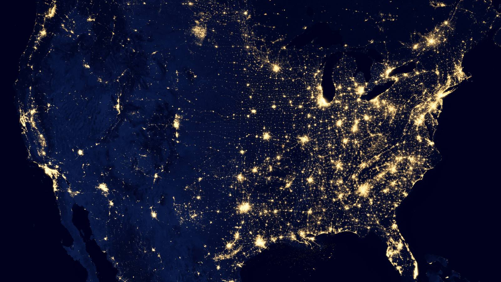 A satelite photo of the united states at night.