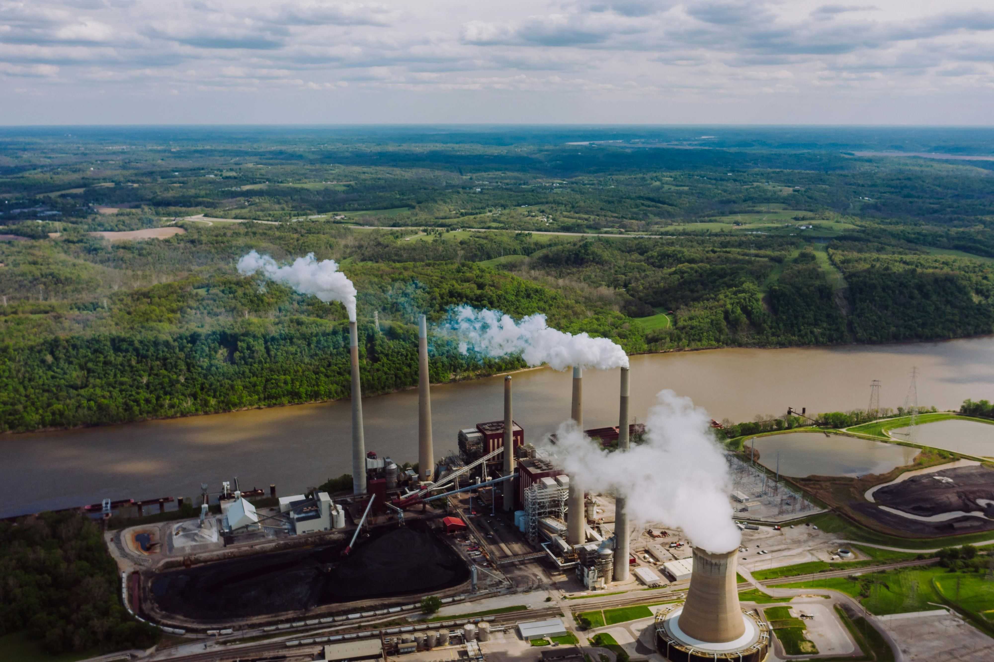 Smoke coming out of chimneys of a coal power plant