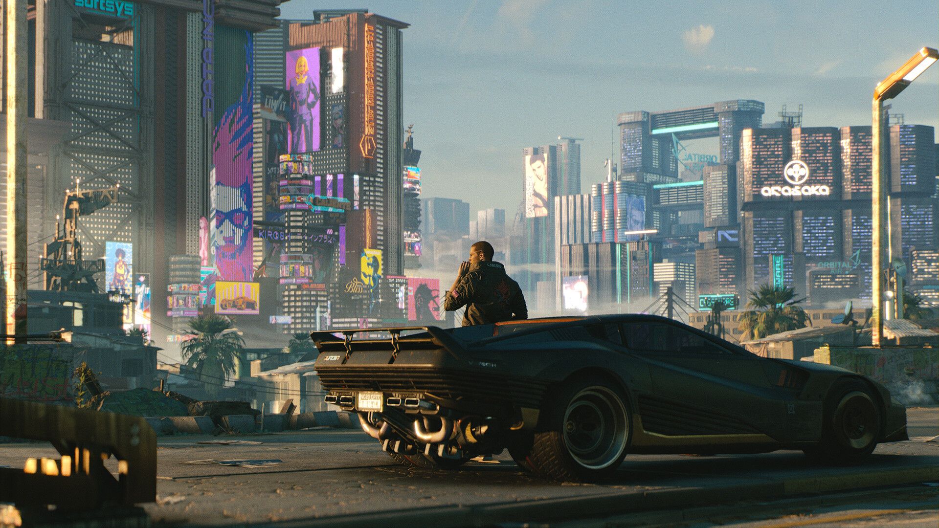 The player character leaning against a car with Night City in the background