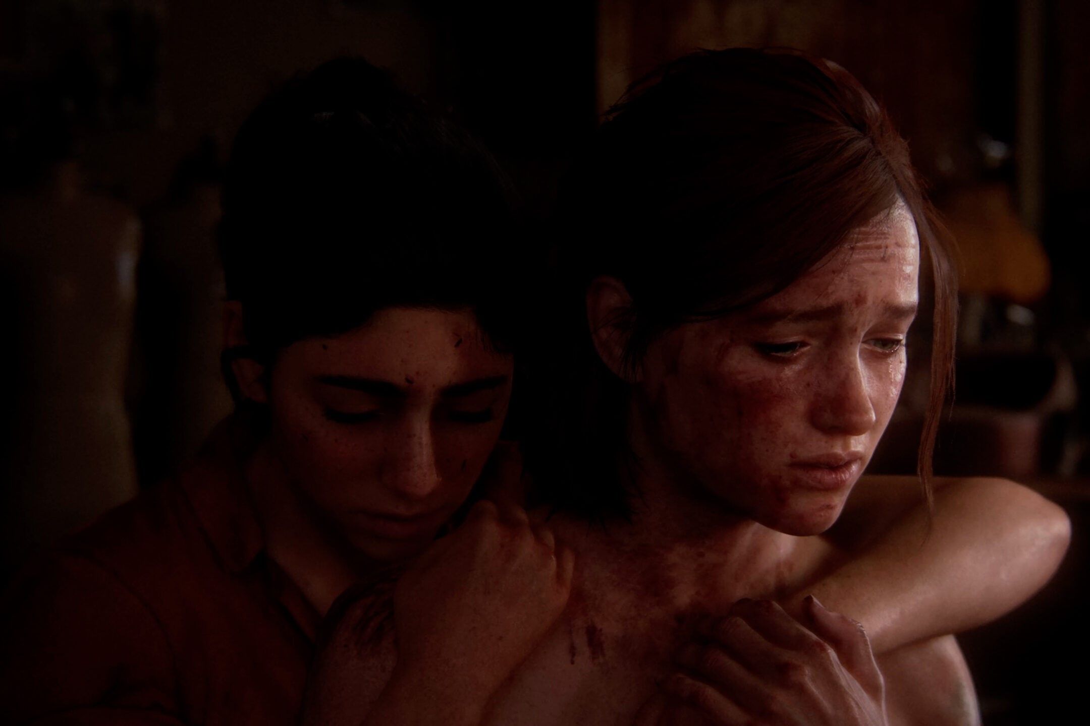 Ellie and Dina embrace.