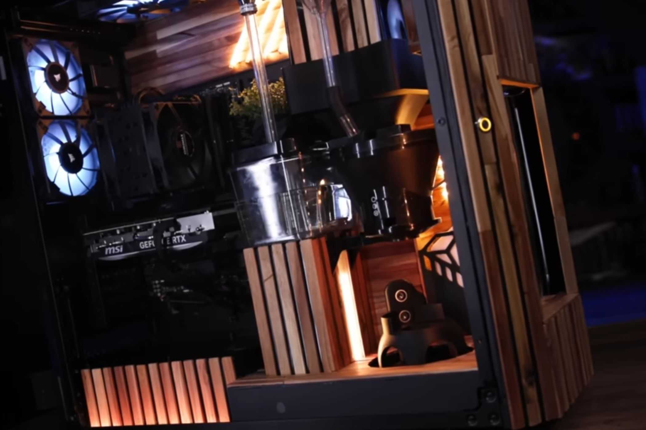 An image showing a close up of a coffee machine that's built inside a PC case