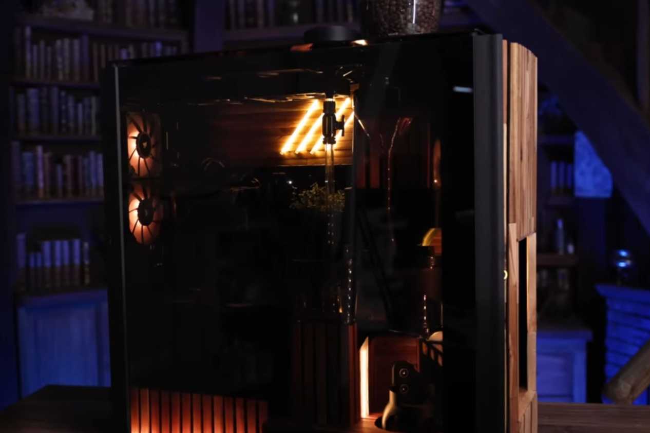 An image showing a PC case with lights and a coffee maker