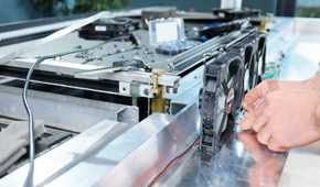 An image showing a person assembling a heatsink and fan assembly