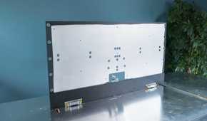 An image showing an aluminum piece cut out standing on another aluminum sheet