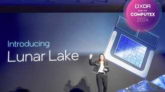 Woman standing in front of a screen with text reading "Introducing Lunar Lake"