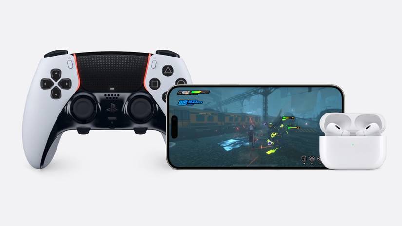 iPhone 15 beside a PlayStation controller and AirPods
