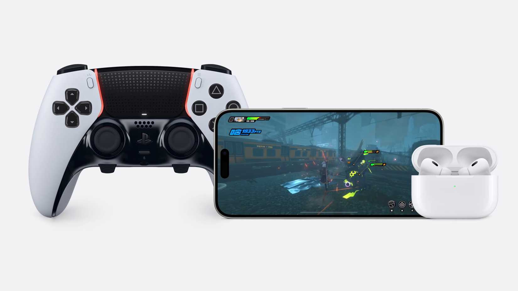 iPhone 15 beside a PlayStation controller and AirPods