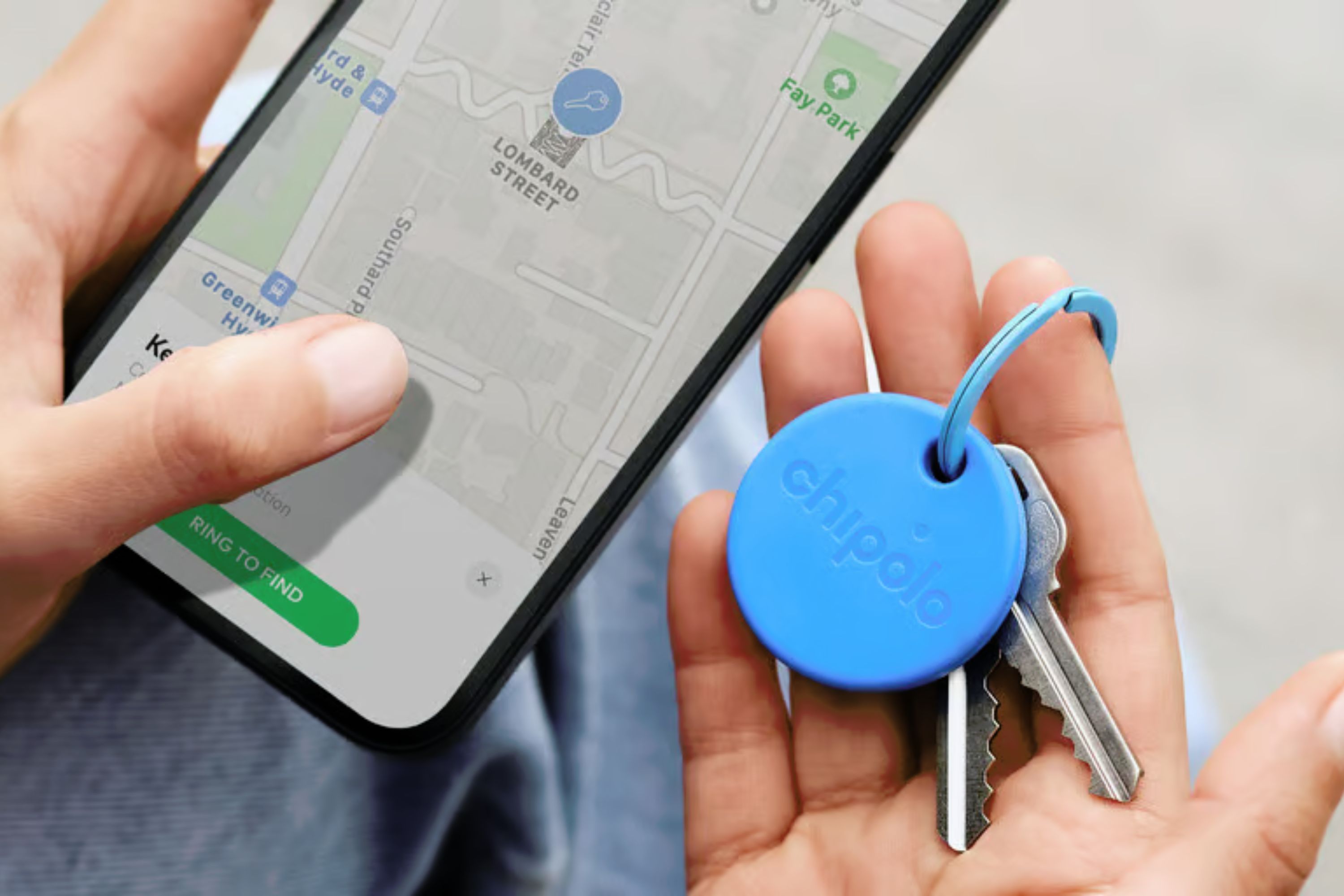 An image of a Blue Chipolo One next to a phone showing the Chipolo app