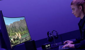 Person gaming on LG UltraGear 39GS95QE monitor