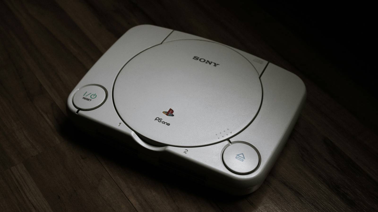 PlayStation 1 on a wooden floor