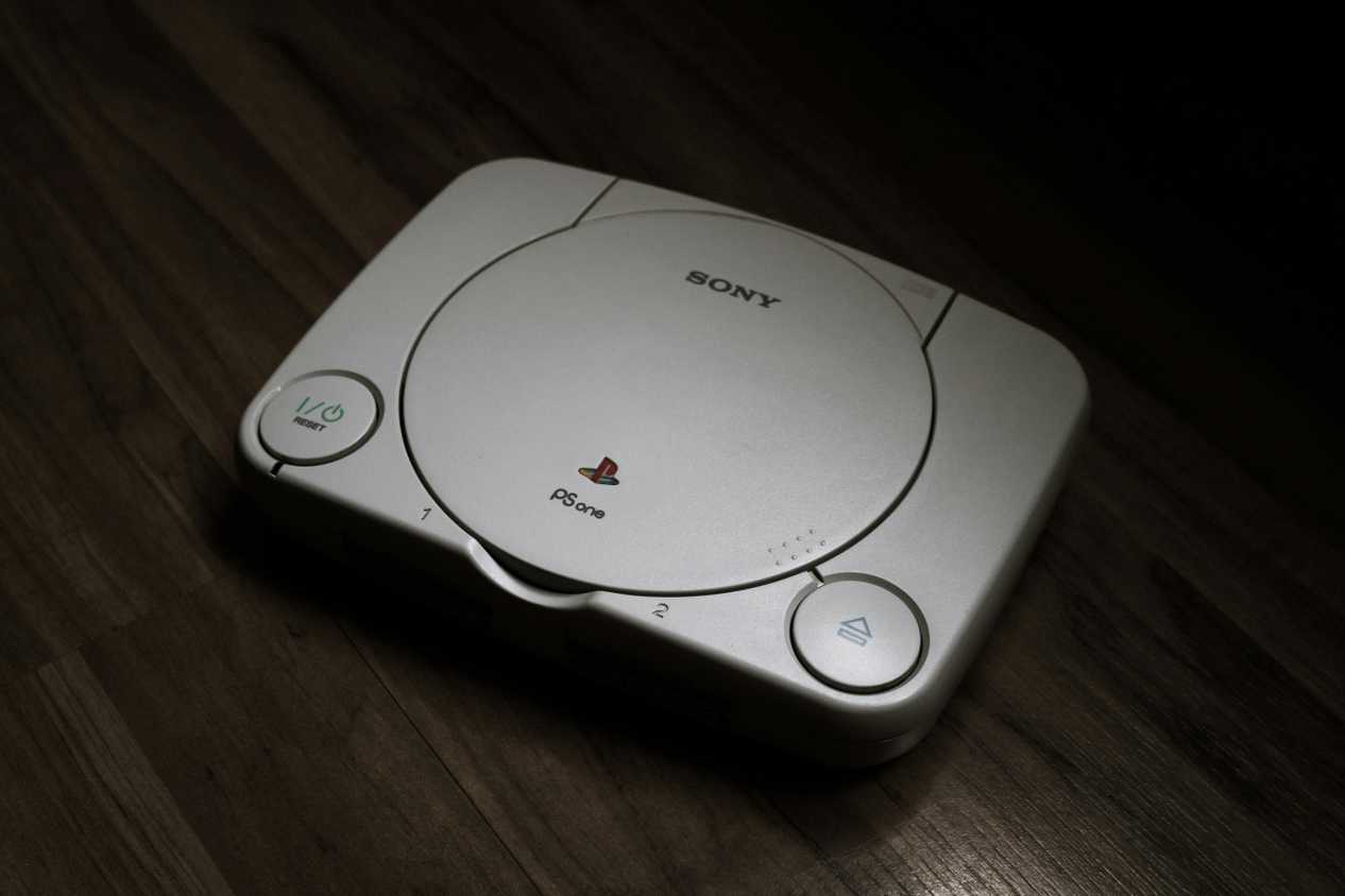 PlayStation 1 on a wooden floor
