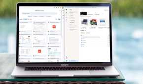 A comparison between Google Drive and Dropbox displayed on a MacBook Pro screen