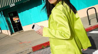 Woman holding a Porcelain Google Pixel 9 Pro in her hand