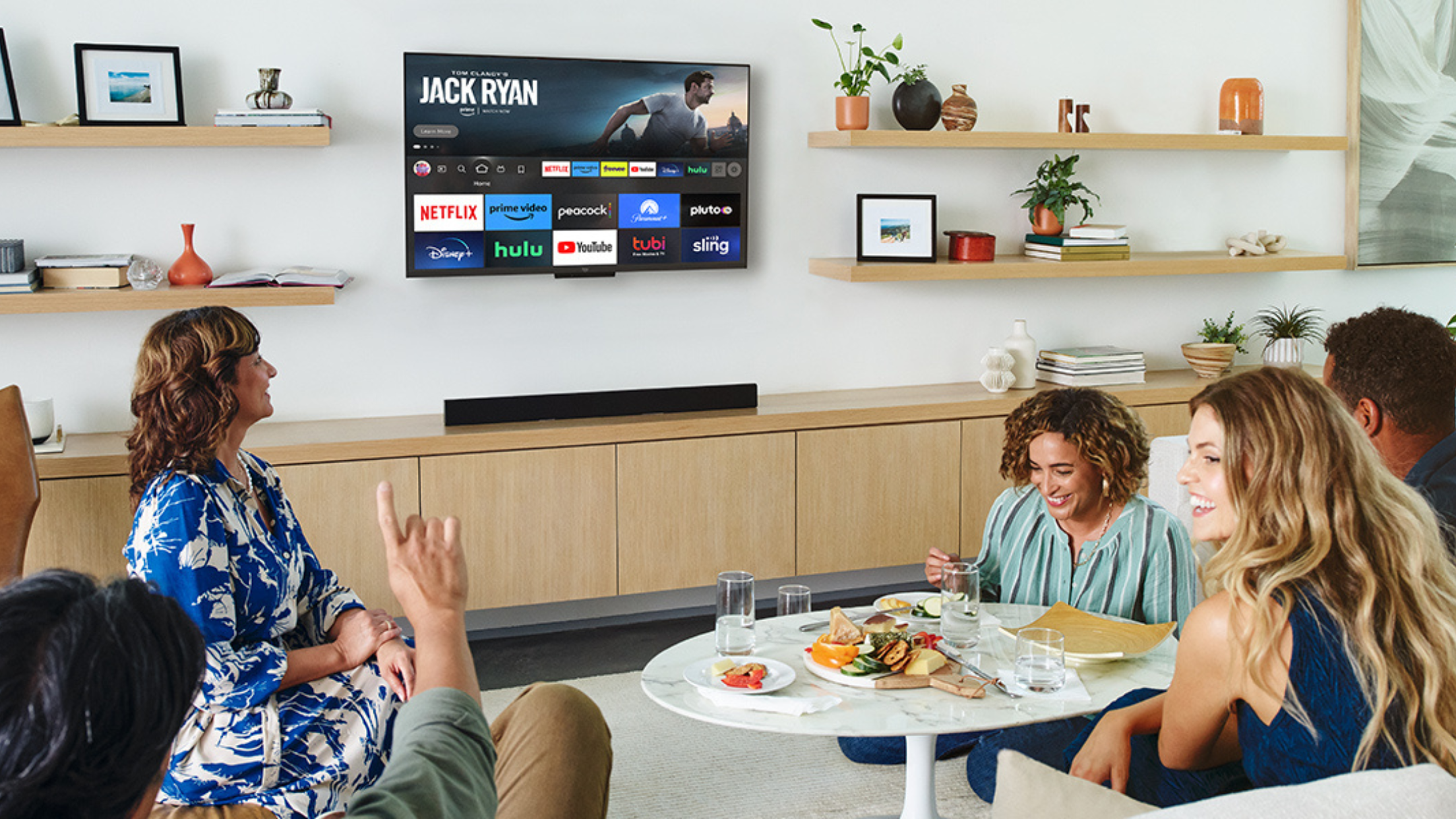 people in living room enjoying TOSHIBA 43-inch Class C350 Series LED 4K UHD Smart Fire TV 