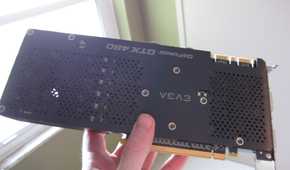 An old Nvidia graphics card in a person's hand