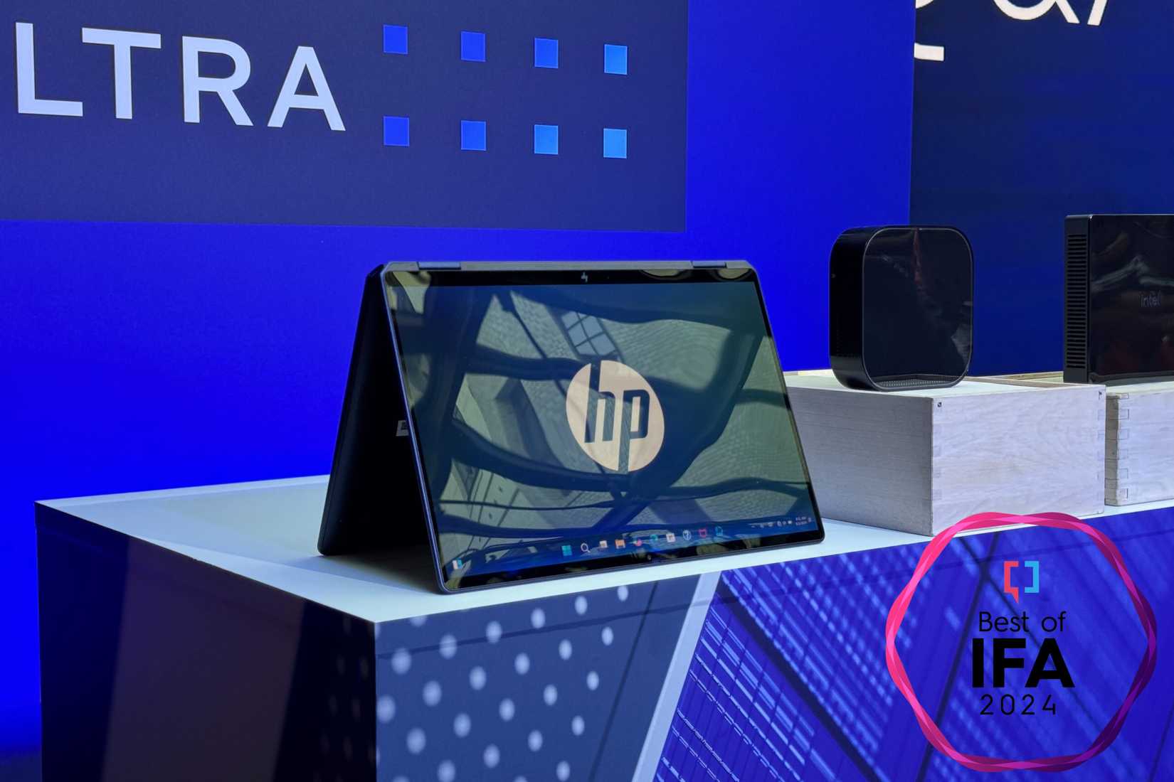 HP OmniBook Ultra Flip 14 in tent mode with badge