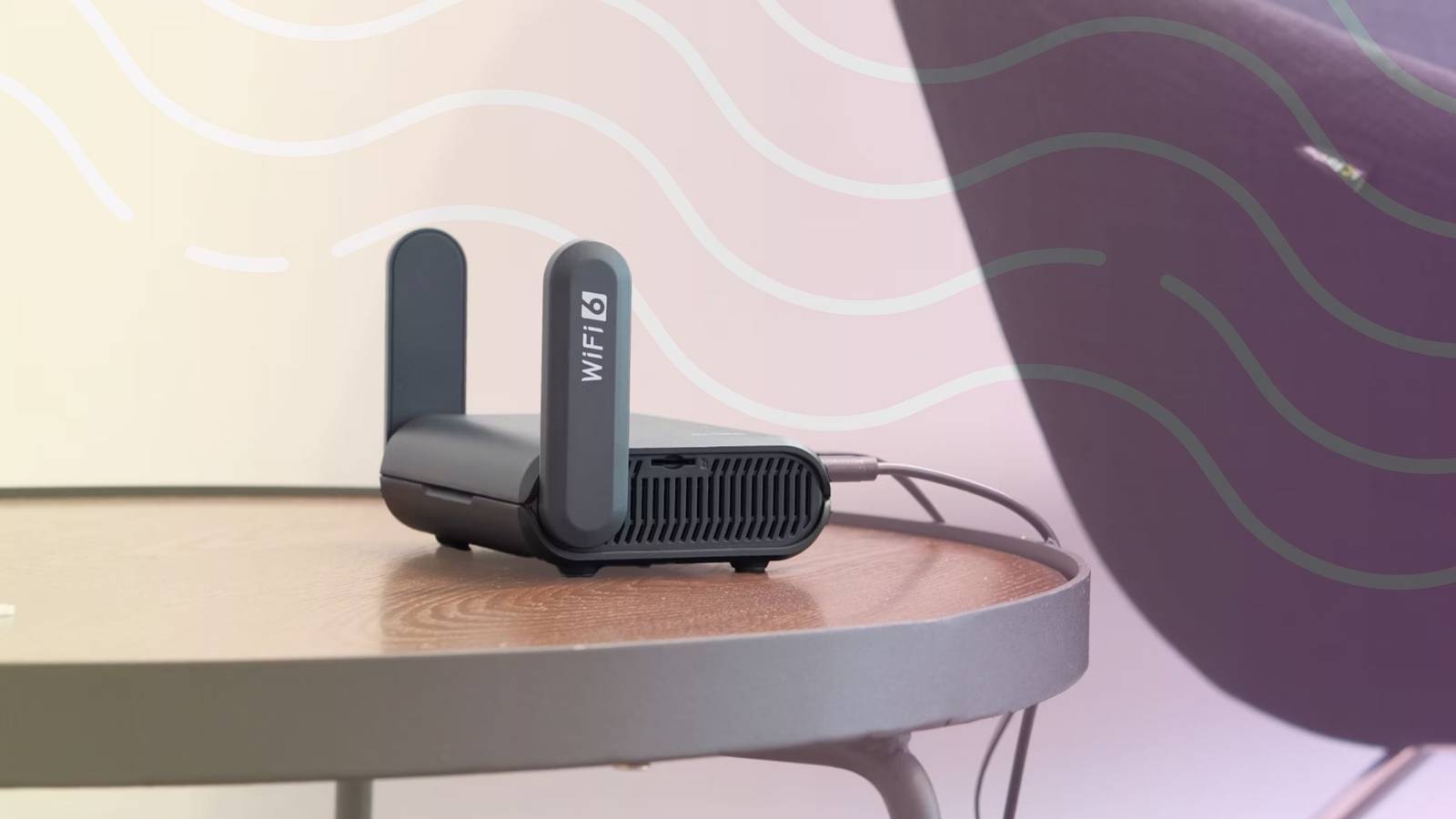 small wifi router on a table with representation of wireless data flowing through the air