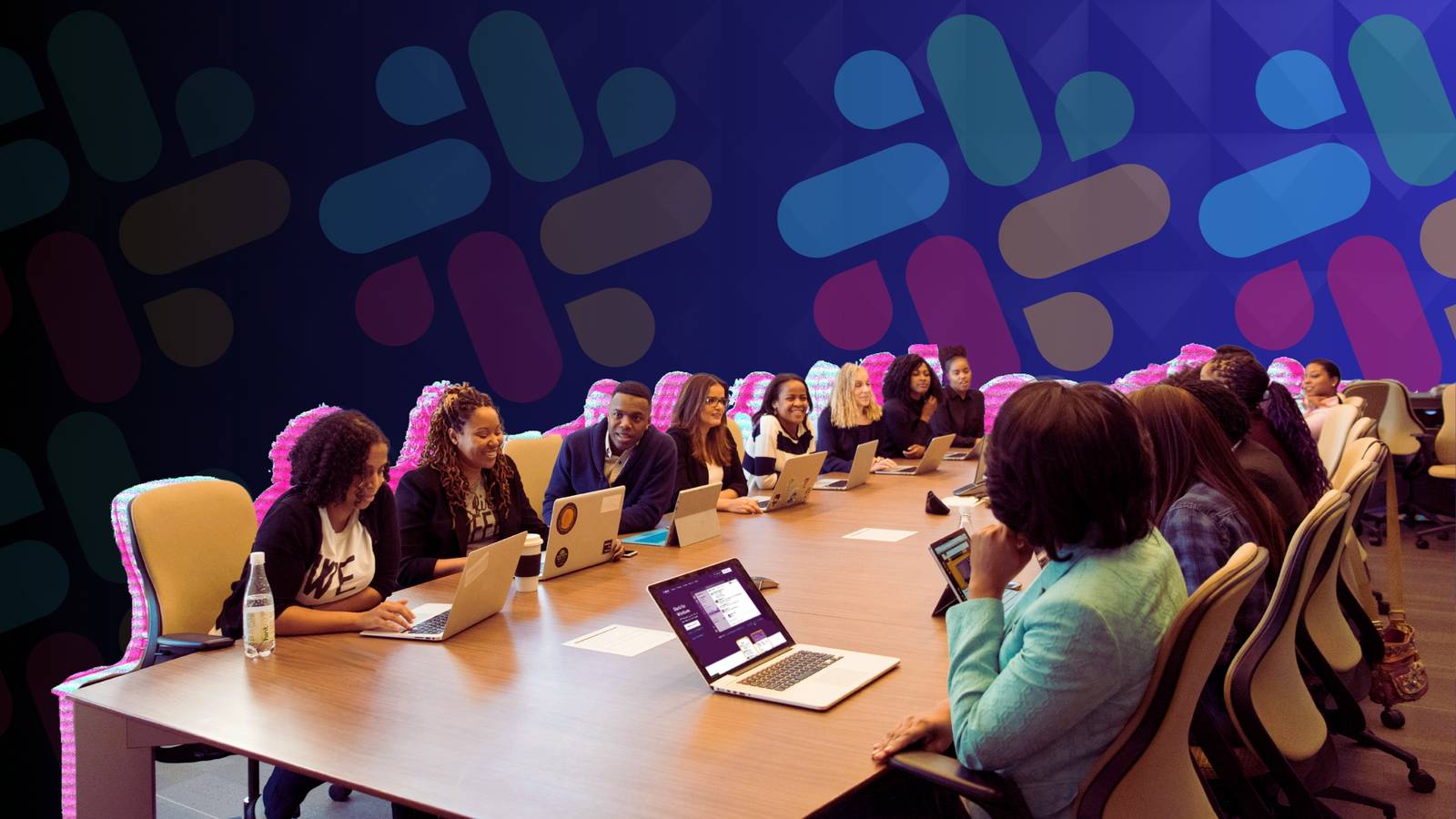 group of people logged into slack on their laptops
