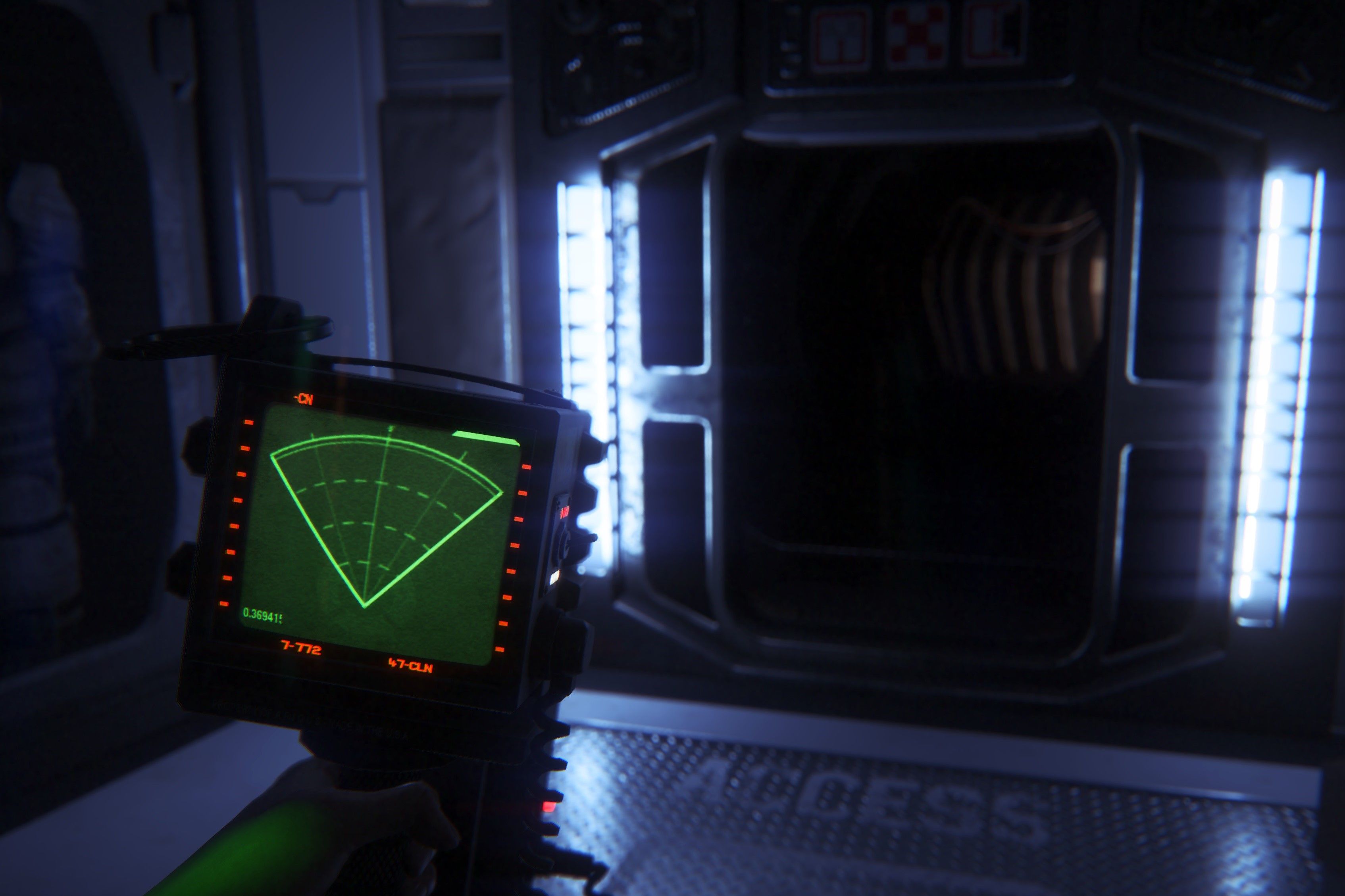 Screenshot of Alien: Isolation showing the protagonist holding a tracking device