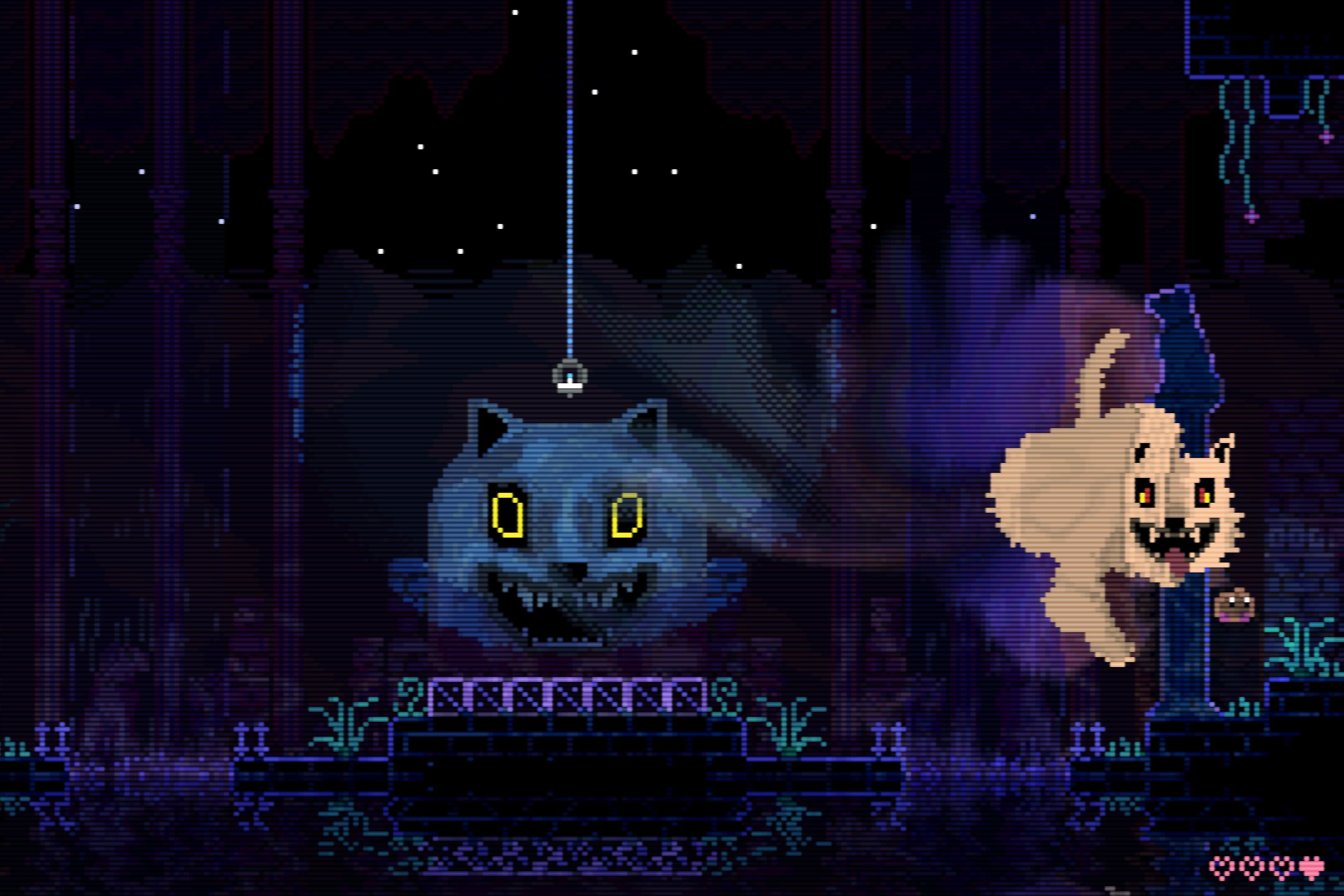Two menacing cats glaring at the screen.